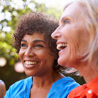 Women laughing together.